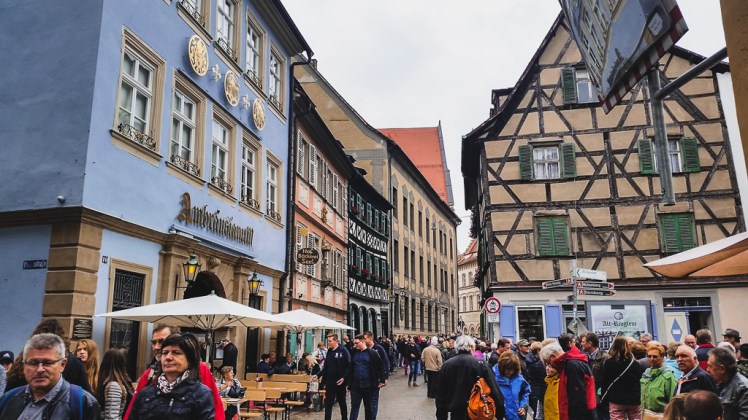 Tourists visiting the busy Sand Street of Bamberg